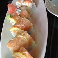 Photo taken at Sushi Koji by Ashley S. on 7/10/2012
