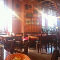 Photo taken at Pizzeria Pavaon by Olga K. on 3/14/2012