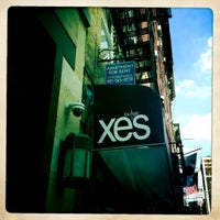 Photo taken at XES Lounge by Pete L. on 6/21/2012
