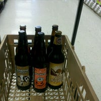 Photo taken at Liquor Outlet Wine Cellars by Tim B. on 8/26/2011