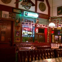 Photo taken at North Beach Pizza by Tina R. on 12/21/2011