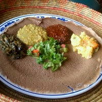 Photo taken at Queen of Sheba Ethiopian Restaurant by Julie H. on 5/8/2011