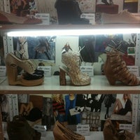 Photo taken at ShoeShoe Concept Store by Andrew V. on 5/26/2011