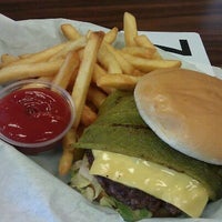 Photo taken at Grizzly Burger House by Jenny L. on 4/18/2012