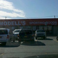 Photo taken at Modell&amp;#39;s Sporting Goods by Johnnie B. on 2/5/2012