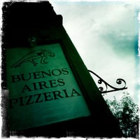 Photo taken at Buenos Aires Pizzeria by Nathan C. on 8/28/2011