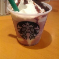 Photo taken at Starbucks Coffee 六本木店 by yumiko k. on 4/18/2012