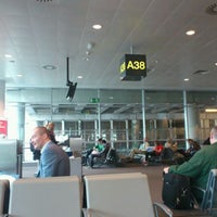 Photo taken at Gate A38 by Charlotte D. on 6/3/2012