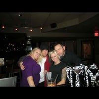 Photo taken at 1 Hundred West Bar &amp;amp; Dance Club by Jennifer M. on 12/9/2011