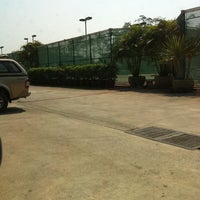 Photo taken at Pyramid Tennis Academy by Bunjong K. on 2/22/2012