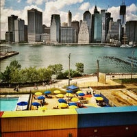 Photo taken at Brooklyn Bridge Park Pop Up Pool by Manny H. on 8/11/2012