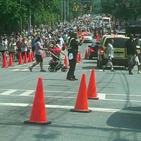 Photo taken at Peachtree Road Race Finish Line by GossipGayATL on 7/4/2012