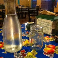 Photo taken at The Earth Cafe &amp;amp; Deli by Courtney G. on 4/15/2012