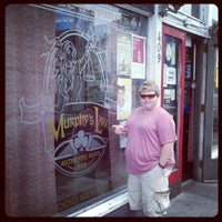 Photo taken at Murphys Law Irish Pub by Athena S. on 6/25/2012