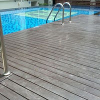 Photo taken at Swimming Pool at the Master Sathorn Executive by Akimoto P. on 5/6/2012