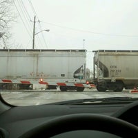 Photo taken at Michigan Street Railroad Crossing by Alan R. on 1/20/2012
