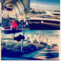Photo taken at American Airlines Curbside Check-in by MAYRA C. on 2/22/2012