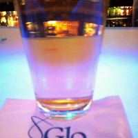 Photo taken at Glo Lounge by Nate T. on 1/1/2012