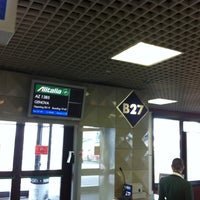 Photo taken at Gate A52 by Pieter D. on 6/29/2012