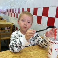 Photo taken at Five Guys by Kam S. on 3/13/2012