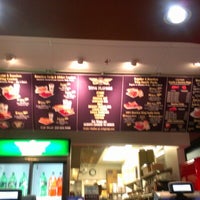 Photo taken at Wingstop by Bryon on 6/29/2012