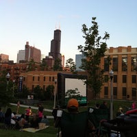 Photo taken at Fulton River District- Movies In The Park by Nicholas D. on 6/29/2011