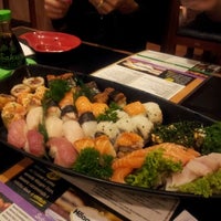 Photo taken at Flying Sushi by Nath M. on 1/10/2012