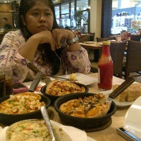 Photo taken at Pizza hut buaran plaza by fitriyana r. on 12/2/2011