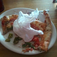 Photo taken at Mia&amp;#39;s Pizza &amp;amp; Eats by David O. on 1/28/2012