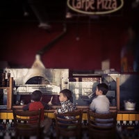 Foto tomada en Proto&amp;#39;s Pizza-Lafayette  por Zach W. el 11/12/2011