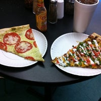 Photo taken at Slices Pizza by Jason L. on 8/15/2012