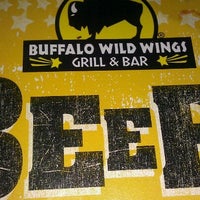 Photo taken at Buffalo Wild Wings by Kenisha P. on 11/30/2011