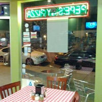 Photo taken at Pepe&amp;#39;s NY Pizza by Julian K. on 1/15/2012
