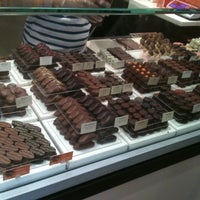Photo taken at Neuhaus Chocolatier by Kyle on 7/31/2011