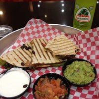 Photo taken at Mucho Burrito Fresh Mexican Grill by Megan H. on 3/17/2012