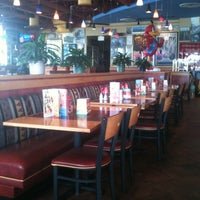 Photo taken at Red Robin Gourmet Burgers and Brews by Nicole on 7/26/2011