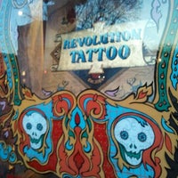 Photo taken at Revolution Tattoo by Miguel R. on 3/16/2012