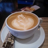 Photo taken at Traveler&amp;#39;s Coffee by Roman G. on 2/25/2012