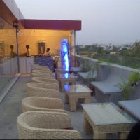 Photo taken at SkyPark Cafe by Shahzoor A. on 4/29/2012