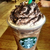 Photo taken at Starbucks by Kate K. on 7/4/2012