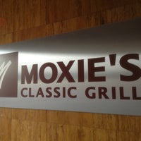 Photo taken at Moxie&amp;#39;s Classic Grill by Ricky S. on 3/21/2012