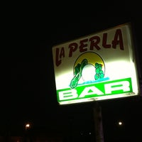Photo taken at La Perla by Bennett J. on 3/8/2012