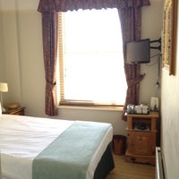 Photo taken at Brighton House Hotel by Line K. on 7/1/2012
