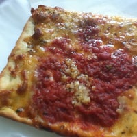 Photo taken at Gino&amp;#39;s Brick Oven Pizza and Trattoria by Ian L. on 9/1/2012