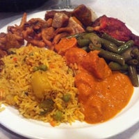 Photo taken at Haveli Indian Restaurant by Justin R. on 4/18/2012