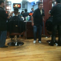 Photo taken at Premium Barber Shop by Alvin U. on 8/2/2012
