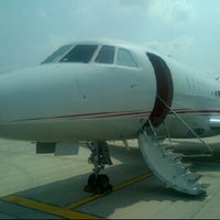 Photo taken at Falcon private jet to Bali @ Seletar airport Singapore by Valentine I. on 6/17/2012
