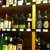 Photo taken at 7th Avenue Wine and Liquor Company by Cassel K. on 1/15/2012