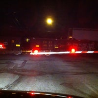 Photo taken at Michigan Street Railroad Crossing by Jay P. on 3/20/2011
