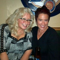 Photo taken at Embers Bar &amp; Grill by Amber G. on 11/26/2011